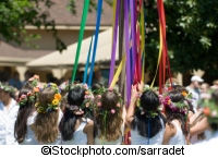 Children dancing around a maypole